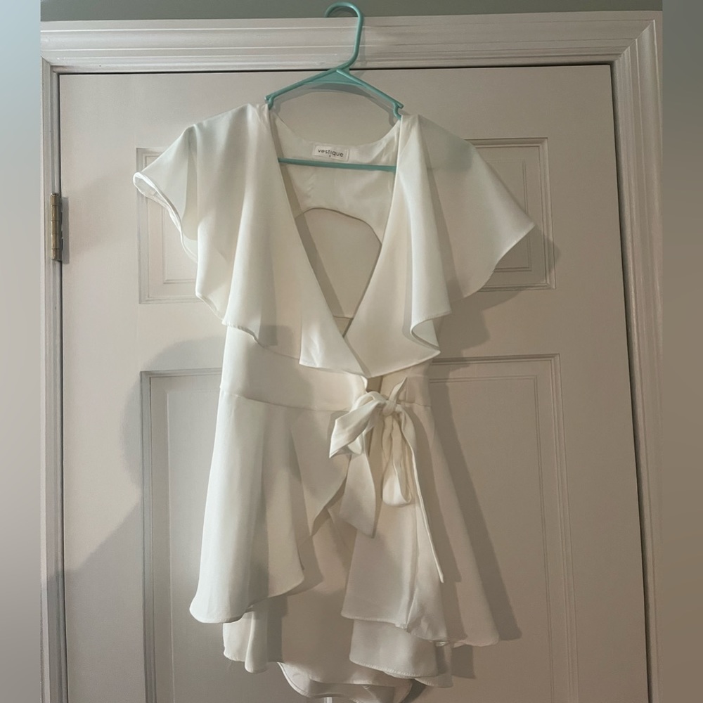 White romper perfect for beach vacation, graduation, conformation, and much more